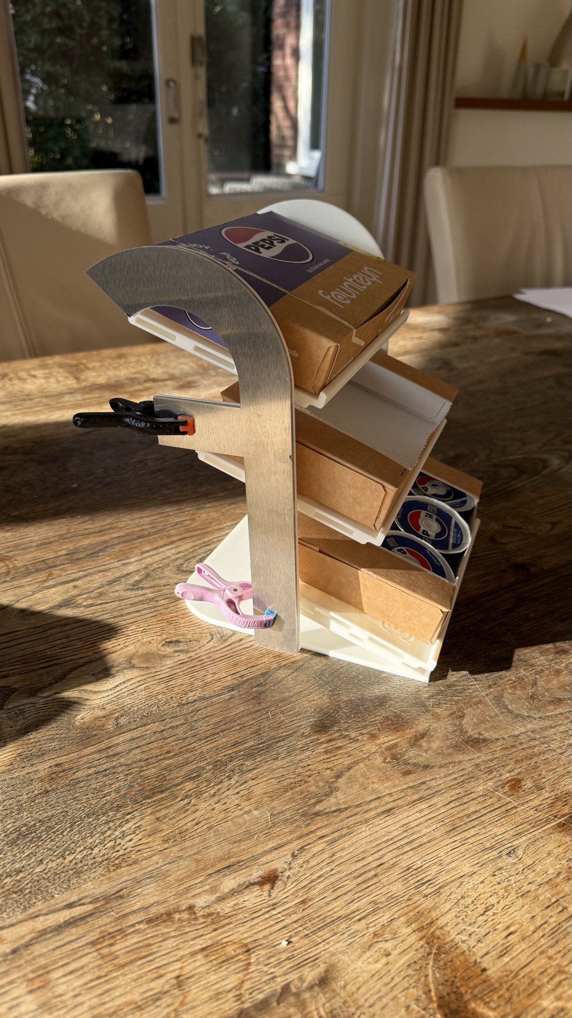 The holder loaded with pod packs in sunlight